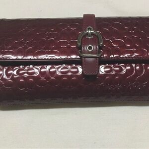 Coach Burgundy Embossed Patent Leather Clutch with Buckle